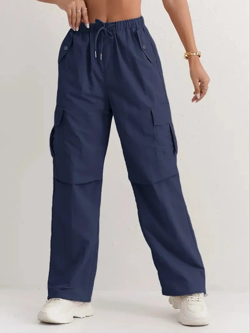 Utility meets style. Our high-waisted cargo pants feature a sleek drape & quick-dry fabric for effortless, modern comfort.