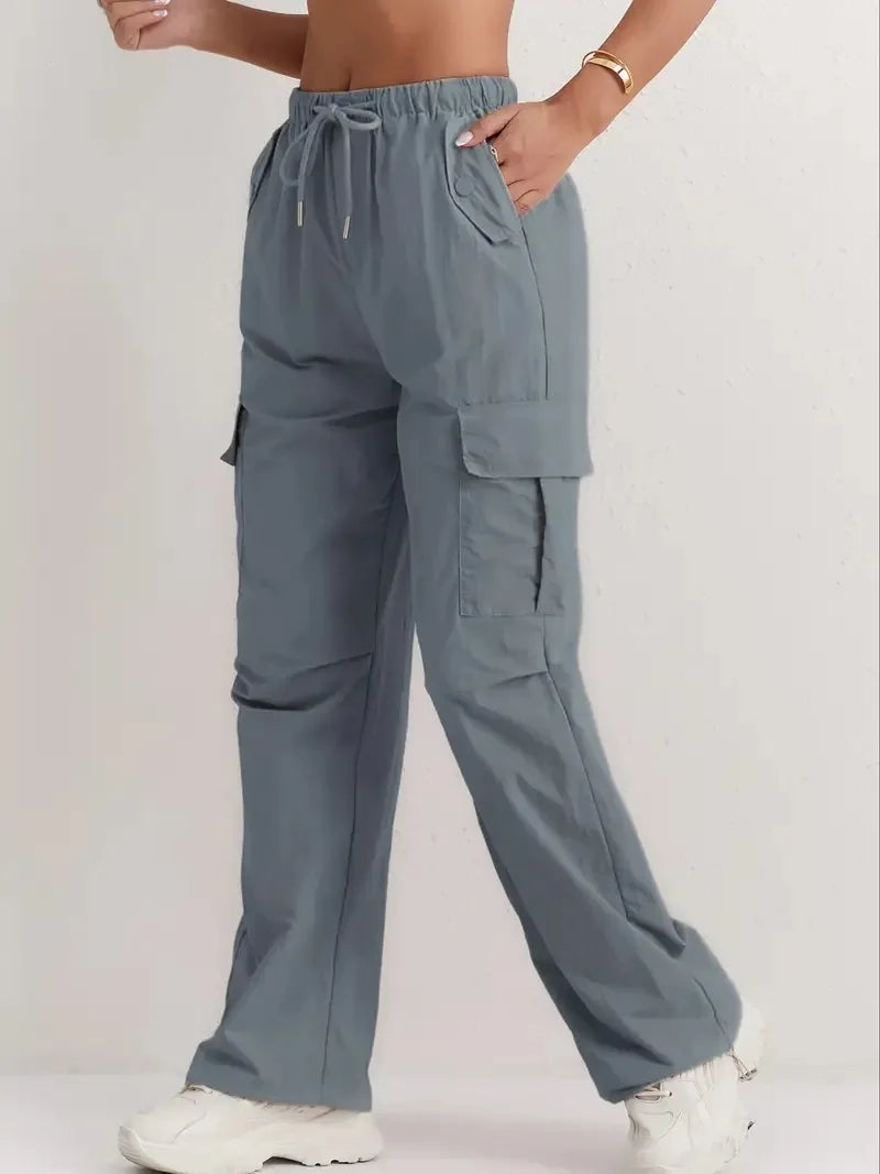 Utility meets style. Our high-waisted cargo pants feature a sleek drape & quick-dry fabric for effortless, modern comfort.