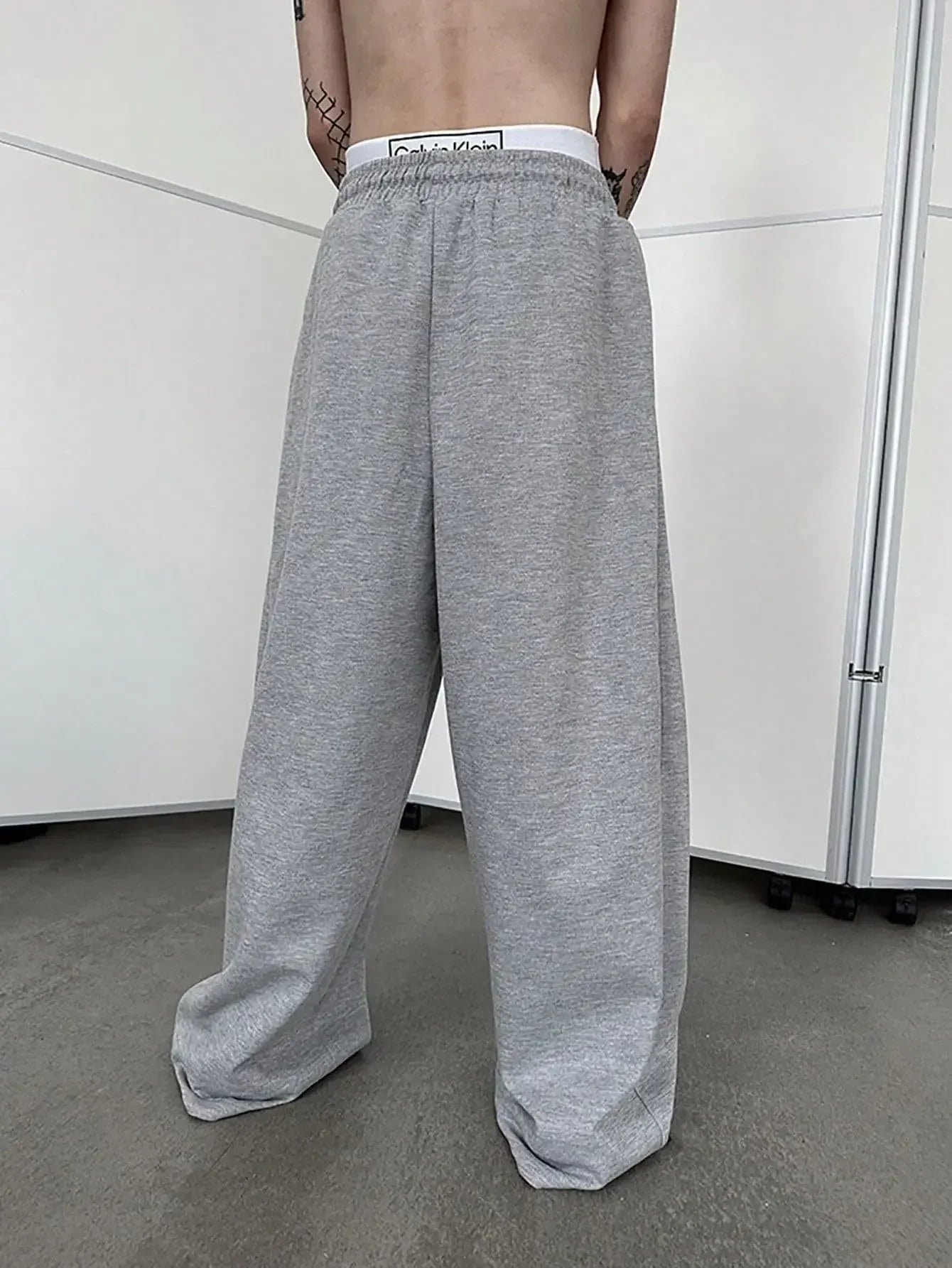 2025 New European and American Men's Sports Pants with Drawstring Waist, Wide Legs, Loose Pants with Pockets