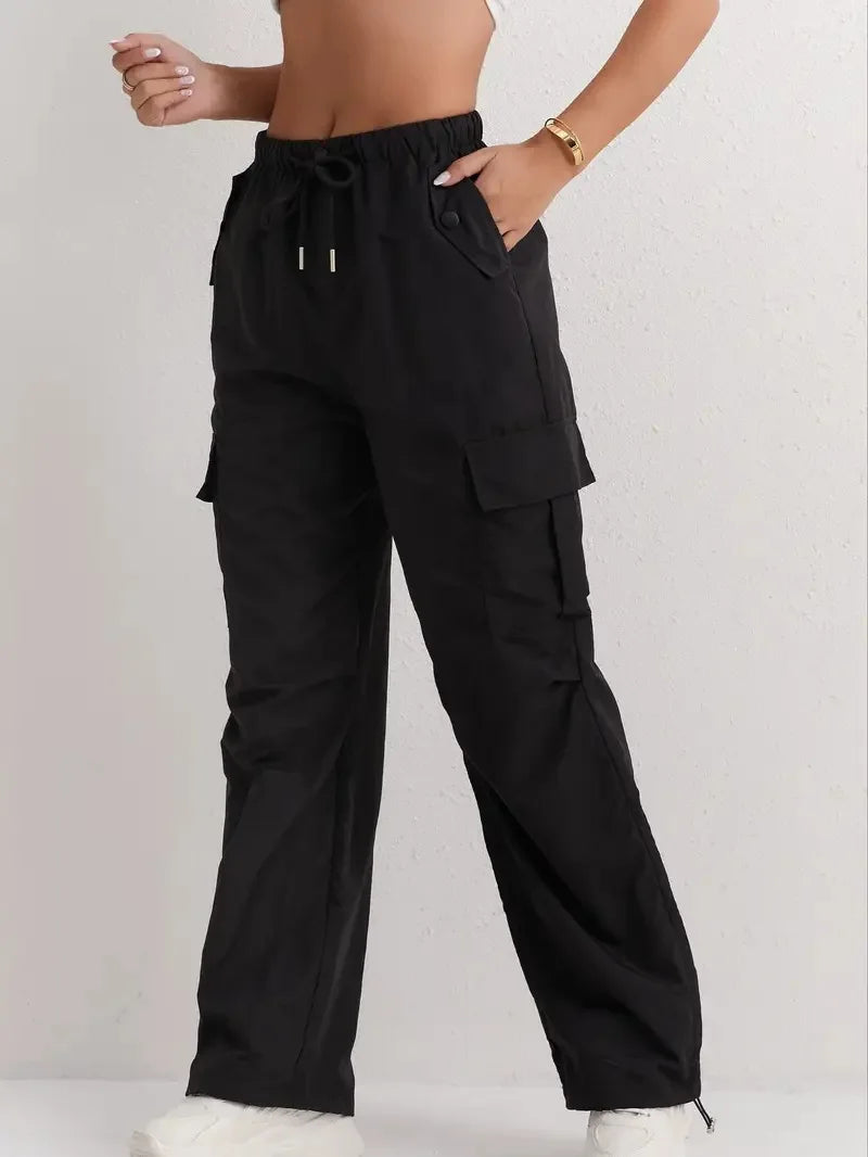 Utility meets style. Our high-waisted cargo pants feature a sleek drape & quick-dry fabric for effortless, modern comfort.