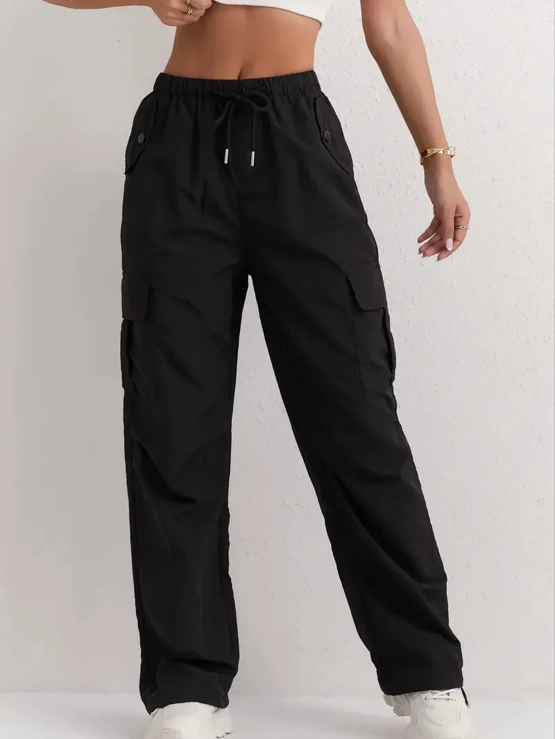 Utility meets style. Our high-waisted cargo pants feature a sleek drape & quick-dry fabric for effortless, modern comfort.