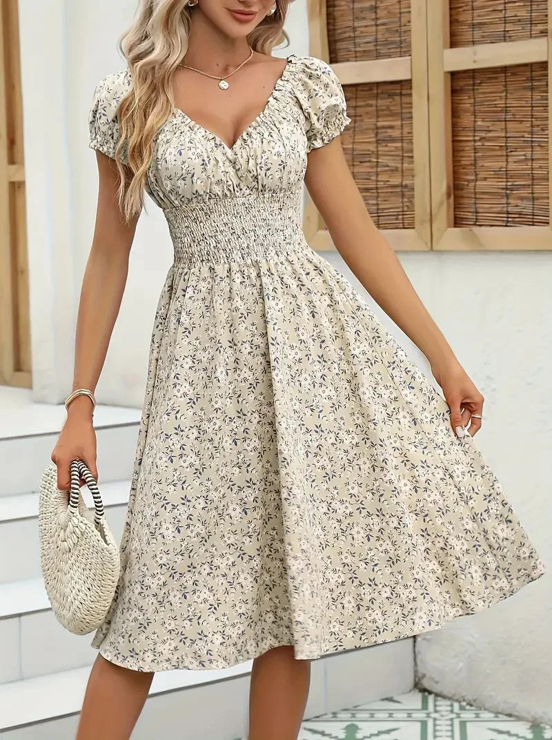 Vintage floral dress with fluffy cuffs and pleated waist cinching, suitable for women's summer beach wear and summer parties