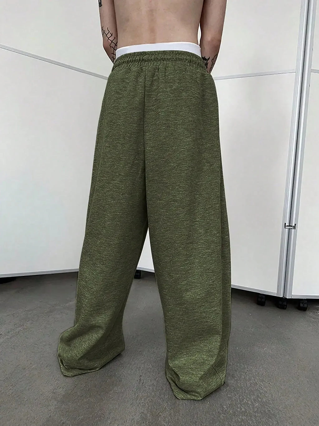 2025 New European and American Men's Sports Pants with Drawstring Waist, Wide Legs, Loose Pants with Pockets